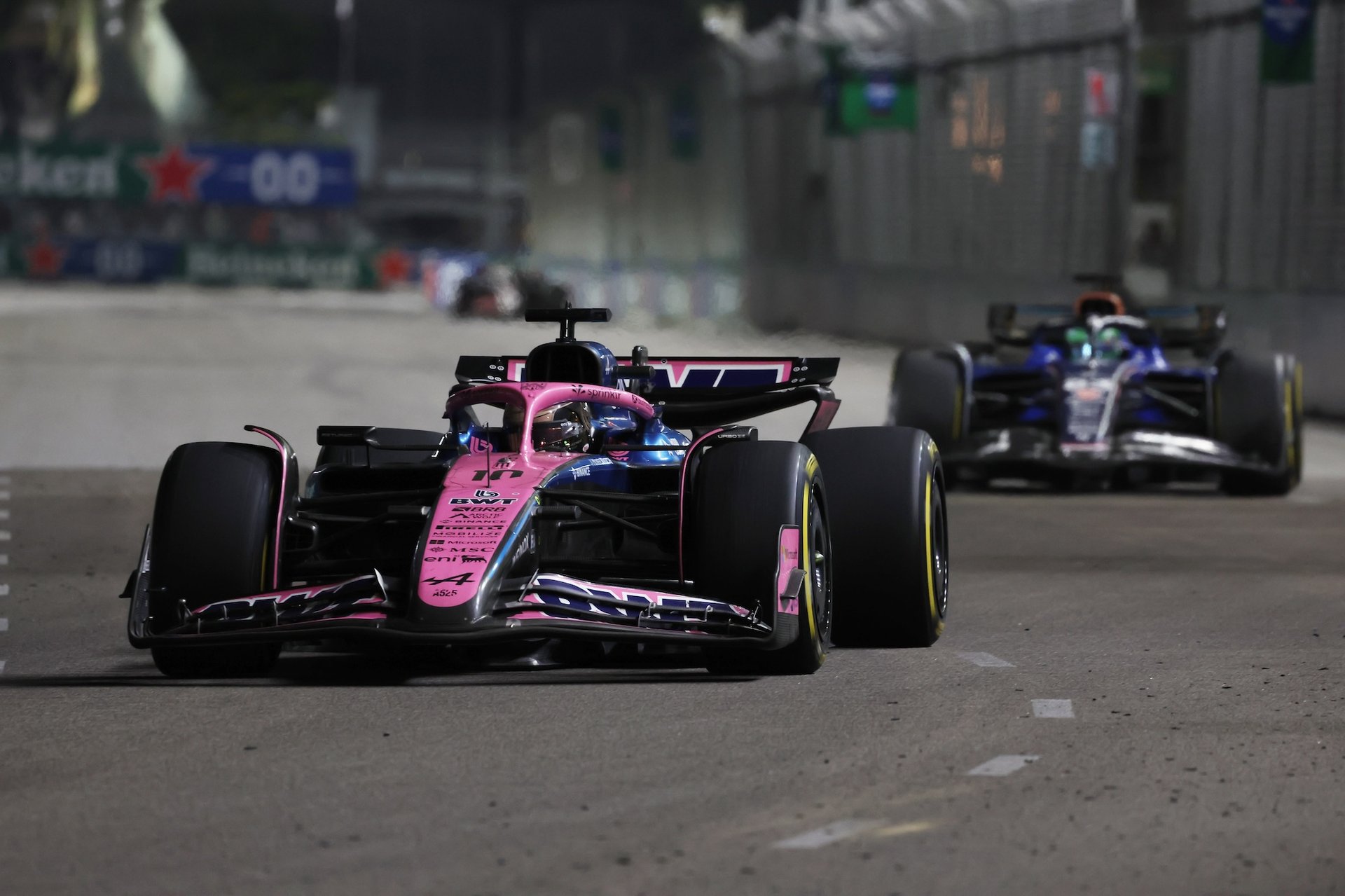 Singapore, Singapore - October 05: Pierre Gasly Of France Driving The (10) Alpine F1 A525 Renault Leads Alexander Albon Of Thailand Driving The (23) Williams Fw47 Mercedes On Track During The F1 Grand Prix Of Singapore At Marina Bay Street Circuit On October 05, 2025 In Singapore, Singapore. (Photo By Glenn Dunbar/Lat Images)